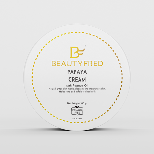 A jar of BeautyFred Papaya Cream with the label detailing the product name and its benefits, such as helping to tone and exfoliate dead cells.
