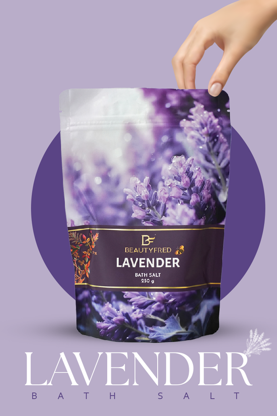 Lavender bath salt packaging with a hand holding it against a purple background