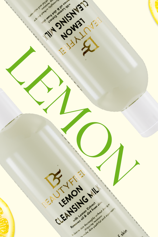 Two bottles of Lemon Cleansing Milk with lemon slices on a light background